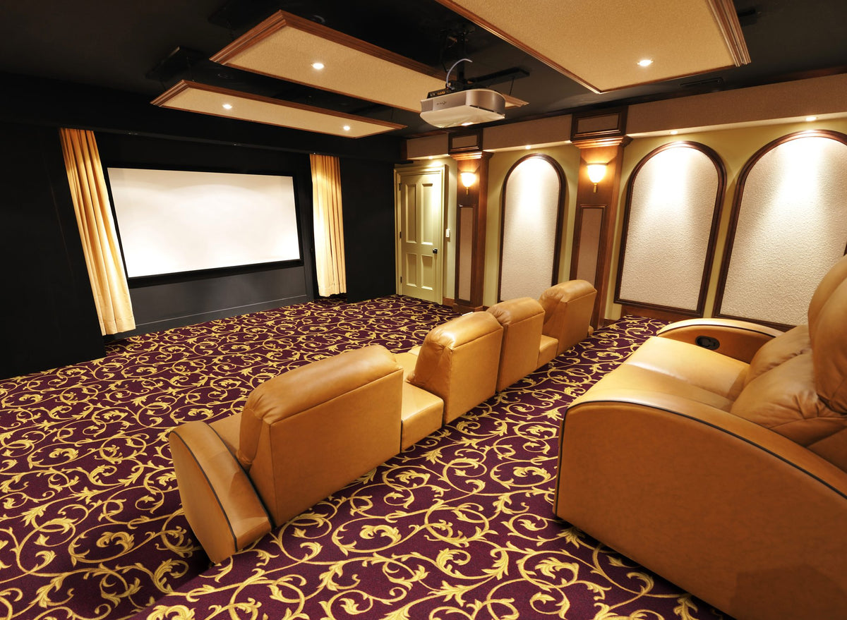 Acanthus home theater carpet in a finished theater room with tiered seating